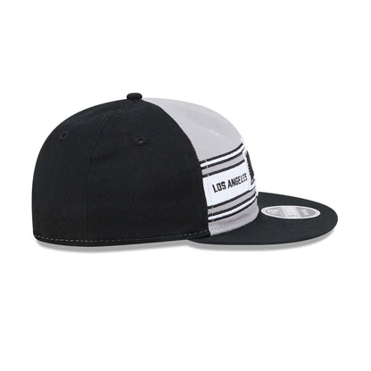 Pictured is this NHL Team Stripes LA Kings Retro Crown 9FIFTY cap in black. 6