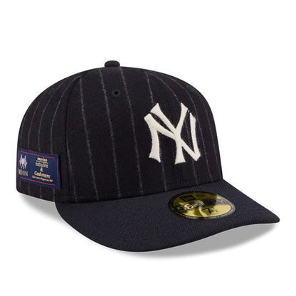 Pictured is this MLB X Moon New York Yankees 59FIFTY Fitted cap in Navy. 1