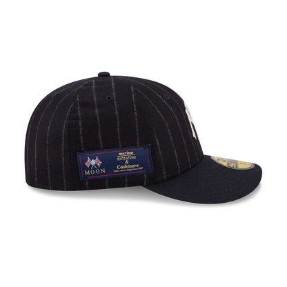 Pictured is this MLB X Moon New York Yankees 59FIFTY Fitted cap in Navy. 5