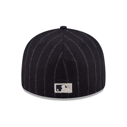 Pictured is this MLB X Moon LA Angels 59FIFTY Fitted cap in Navy. 7