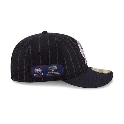 Pictured is this MLB X Moon LA Angels 59FIFTY Fitted cap in Navy. 5