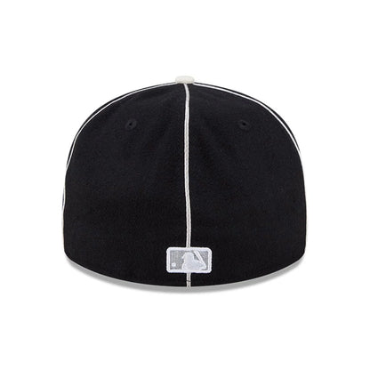 Pictured is this MLB Felt Logo Chicago White Sox Retro Crown 59FIFTY Fitted cap in black. 5