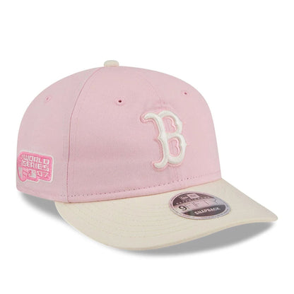 Pictured is this MLB Washed Tie Dye Boston Red Sox 9FIFTY Snapback cap in pastel pink. 1