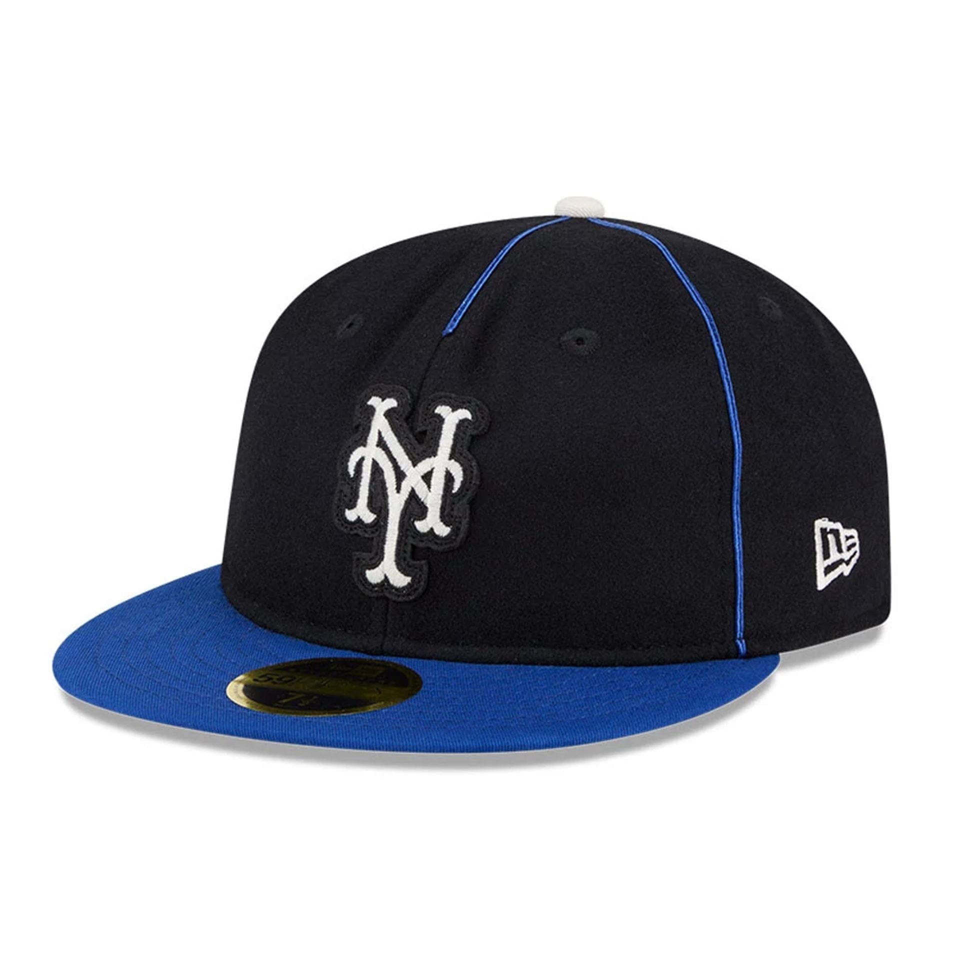 Pictured is this MLB Felt Logo New York Mets Retro Crown 59FIFTY Fitted cap in blue. 1