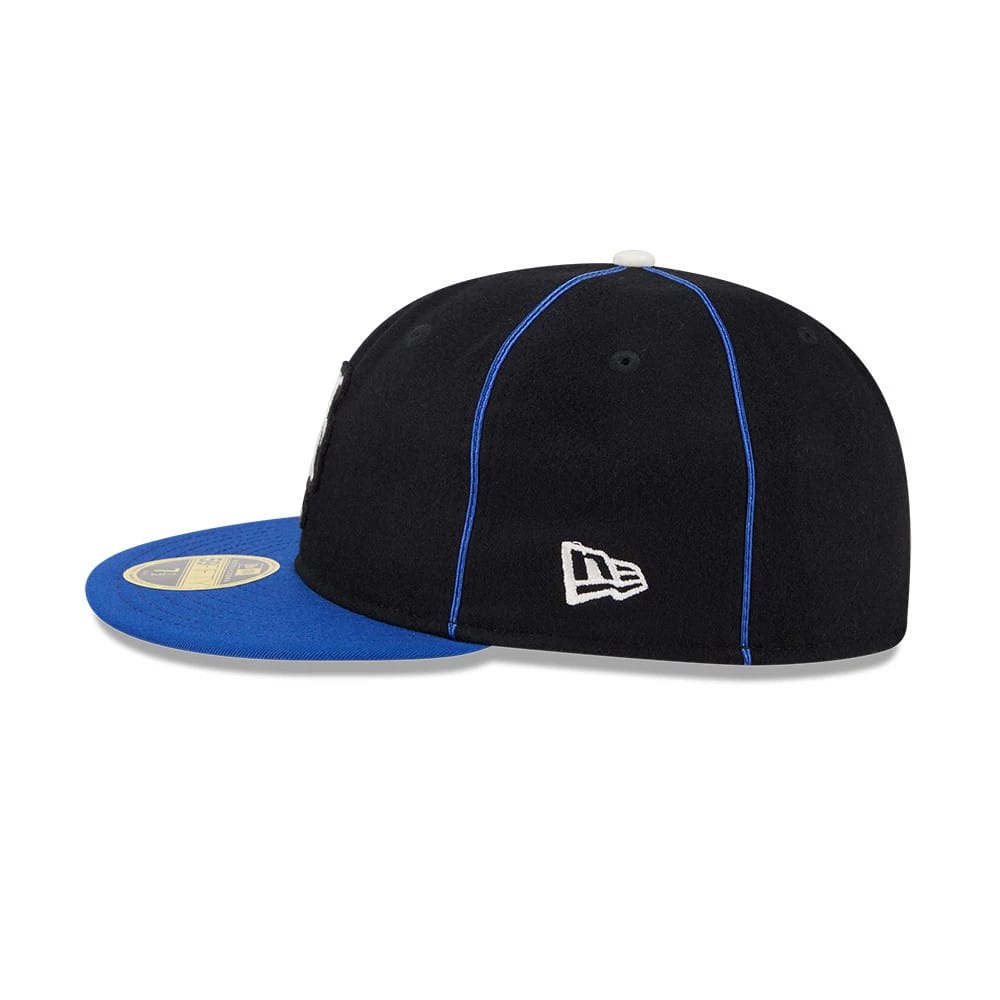 Pictured is this MLB Felt Logo New York Mets Retro Crown 59FIFTY Fitted cap in blue. 5