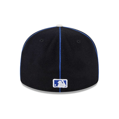 Pictured is this MLB Felt Logo New York Mets Retro Crown 59FIFTY Fitted cap in blue. 7