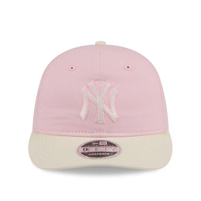Pictured is this MLB Washed Tie Dye New York Yankees 9FIFTY Snapback cap in pastel pink. 2
