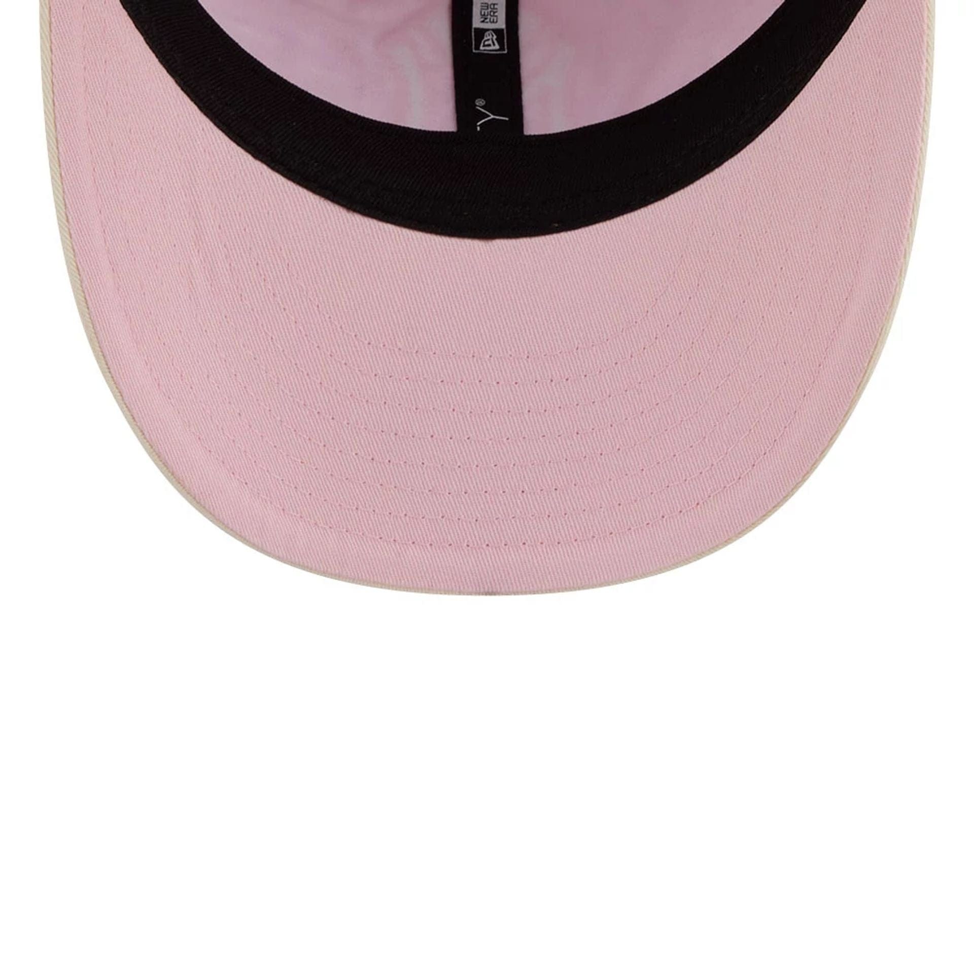 Pictured is this MLB Washed Tie Dye New York Yankees 9FIFTY Snapback cap in pastel pink. 7