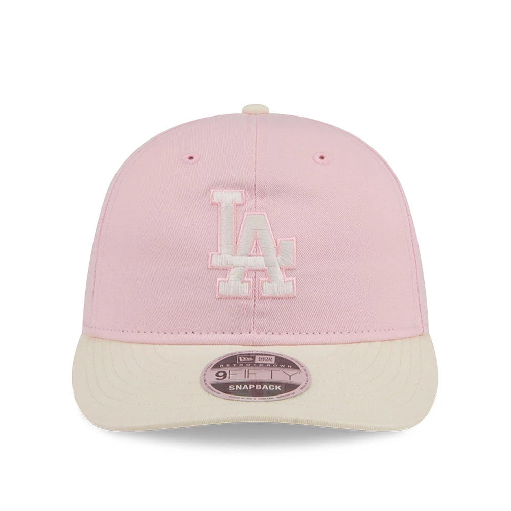 Pictured is this MLB Washed Tie Dye LA Dodgers 9FIFTY Snapback cap in pastel pink. 2