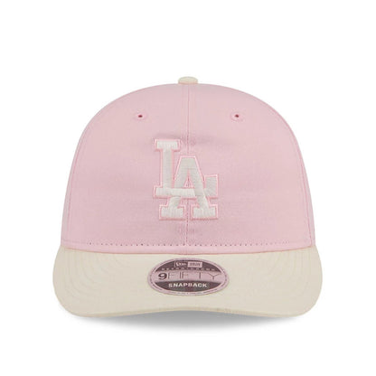 Pictured is this MLB Washed Tie Dye LA Dodgers 9FIFTY Snapback cap in pastel pink. 2