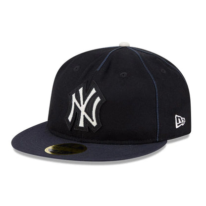Pictured is this MLB Felt Logo New York Yankees Retro Crown 59FIFTY Fitted cap in navy. 1