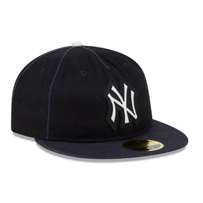 Pictured is this MLB Felt Logo New York Yankees Retro Crown 59FIFTY Fitted cap in navy. 4
