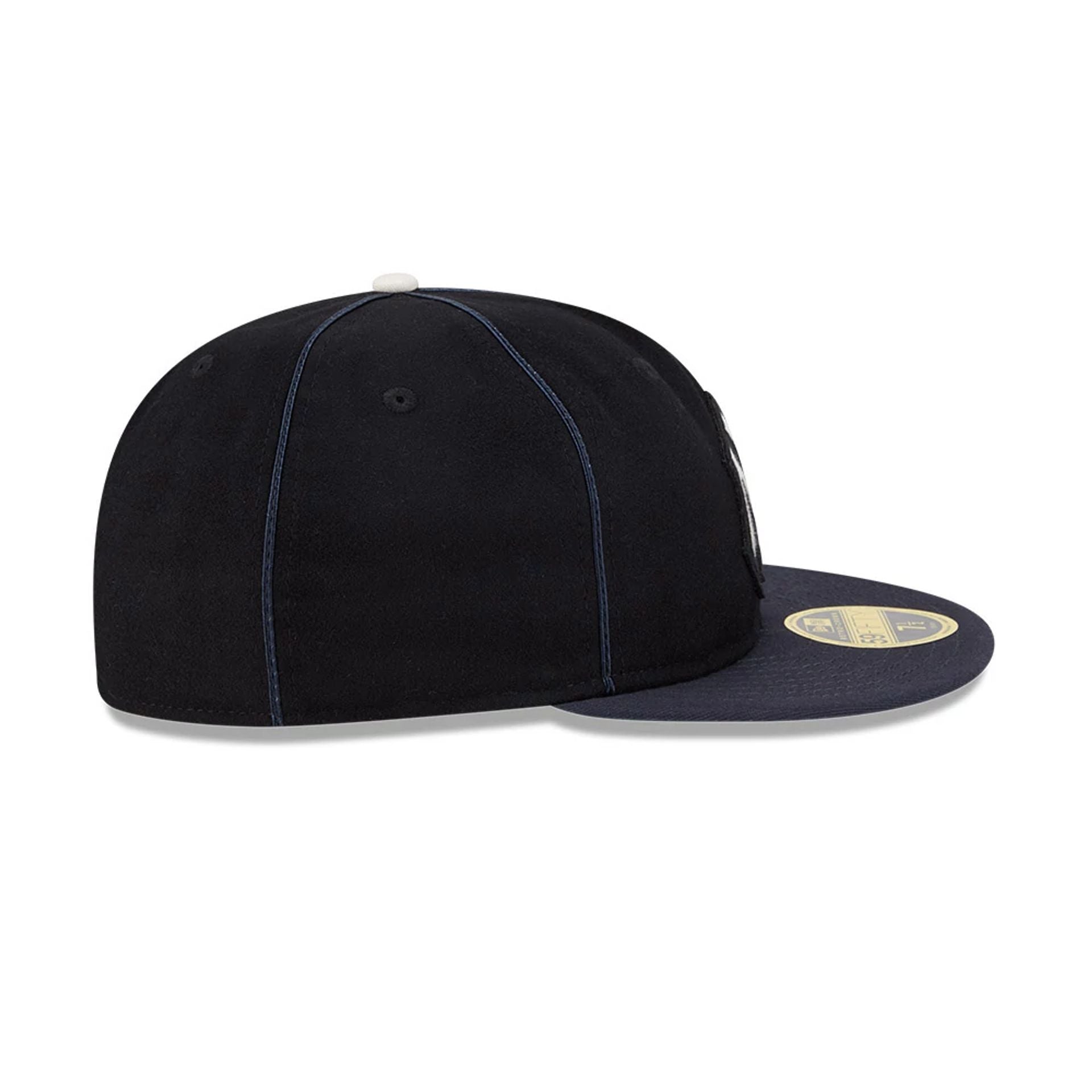 Pictured is this MLB Felt Logo New York Yankees Retro Crown 59FIFTY Fitted cap in navy. 6