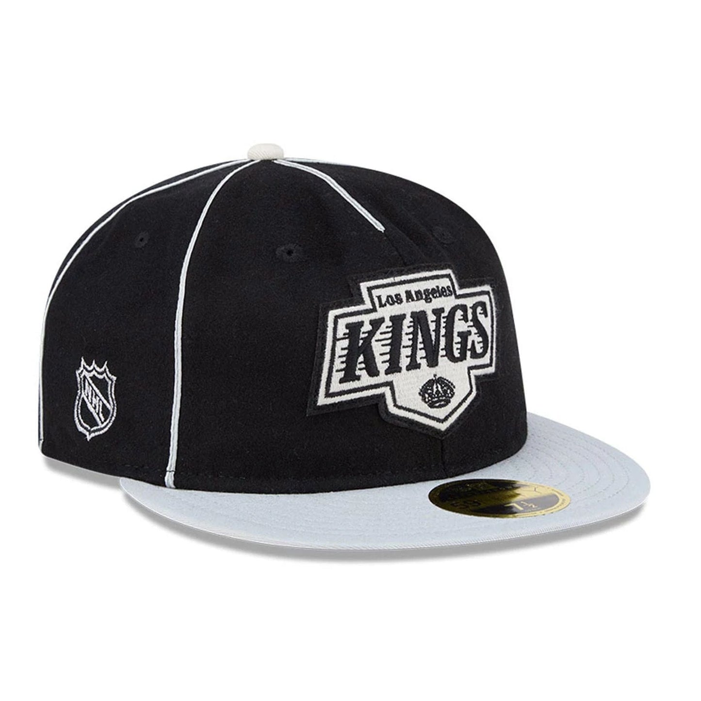 Pictured is this NHL Felt Logo LA Kings Retro Crown 59FIFTY Fitted cap in black. 1