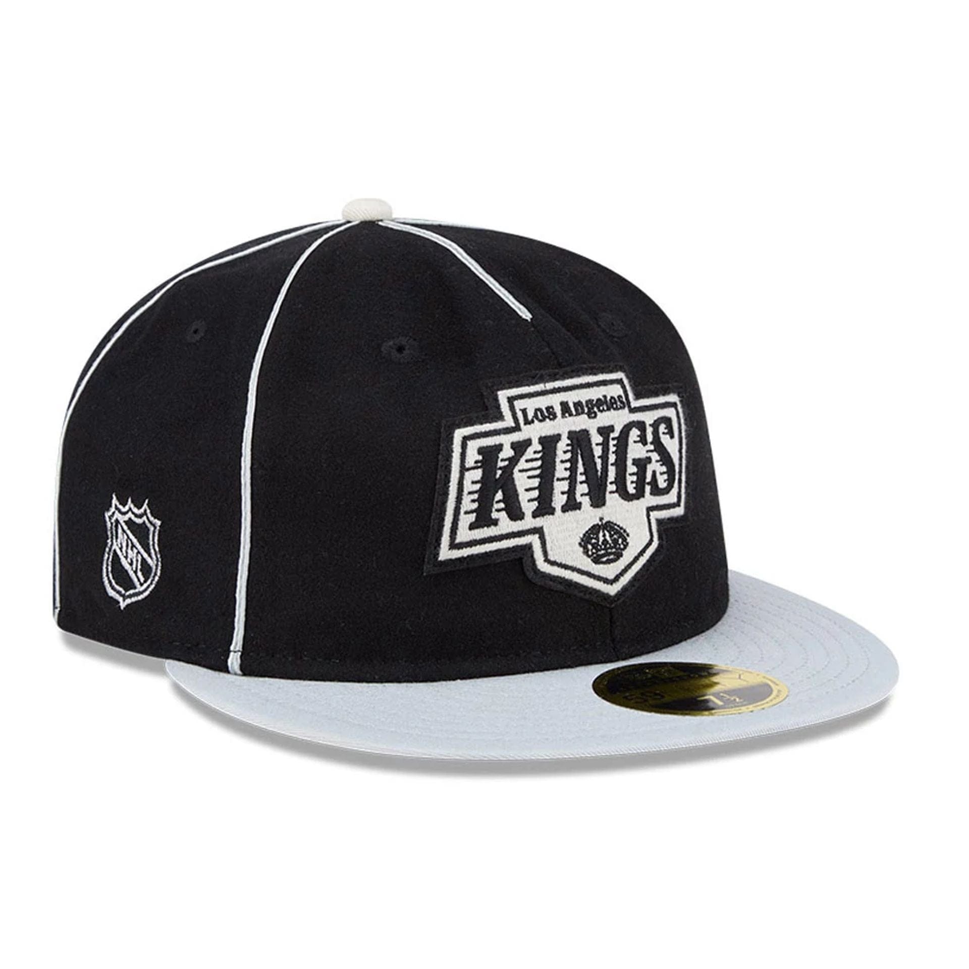 Pictured is this NHL Felt Logo LA Kings Retro Crown 59FIFTY Fitted cap in black. 1