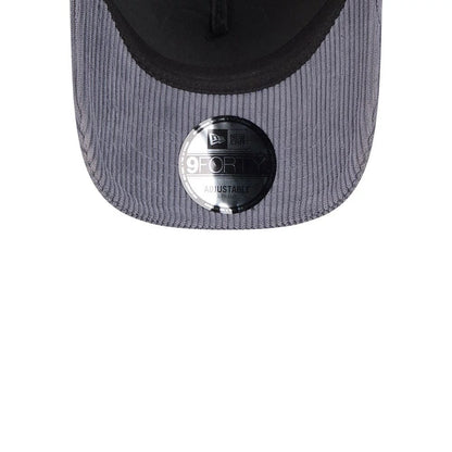 Pictured is this New Era Wide Cord 9FORTY A-Frame Trucker cap in dark blue. 7