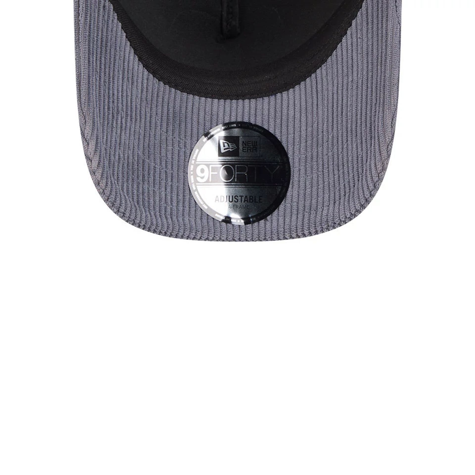 Pictured is this New Era Wide Cord 9FORTY A-Frame Trucker cap in dark blue. 7