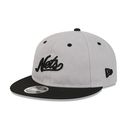 Pictured is this NBA Chainstitch Script Brooklyn Nets Retro Crown 9FIFTY cap in grey. 4