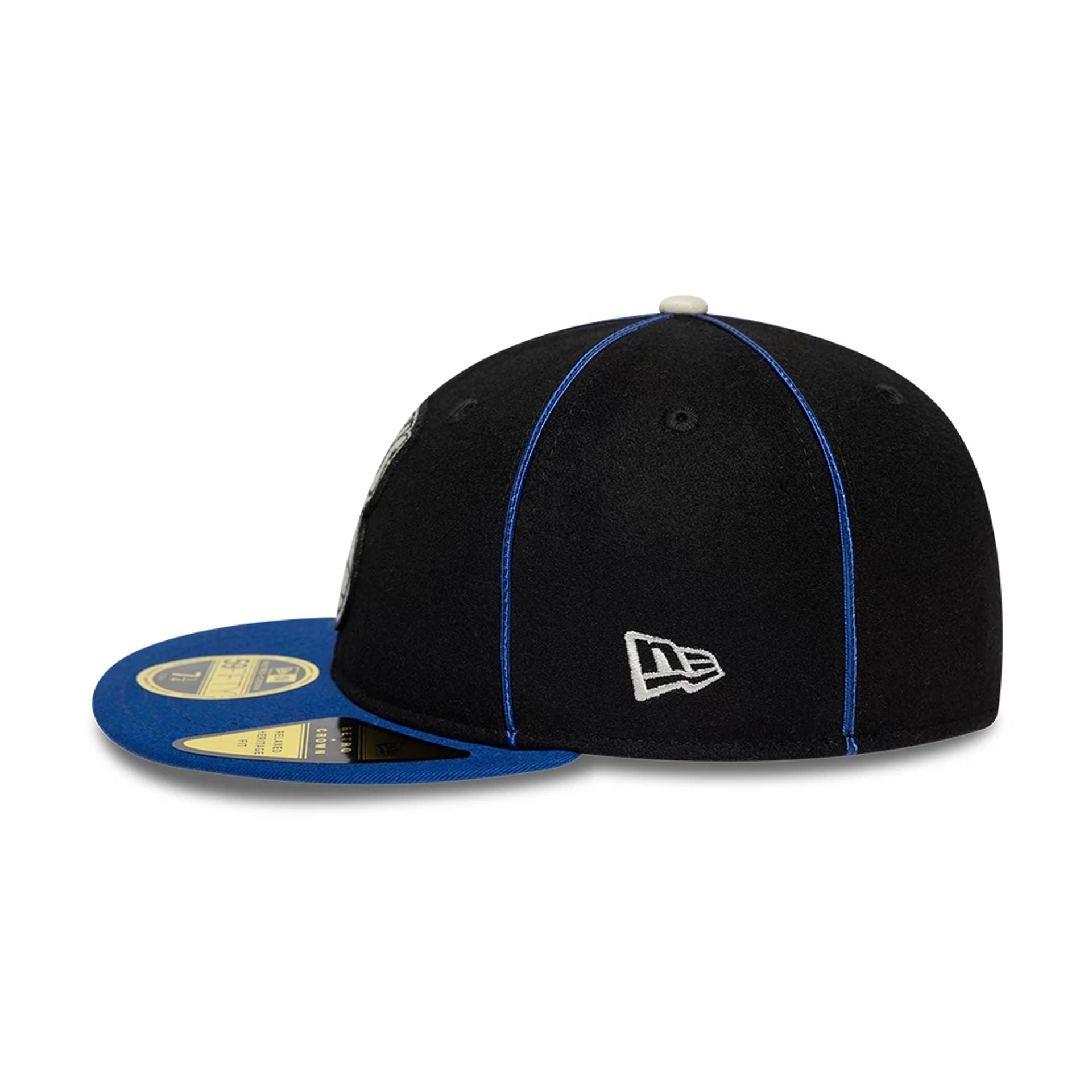 Pictured is this NBA Felt Logo New York Knicks Retro Crown 59FIFTY Fitted cap in dark blue. 6