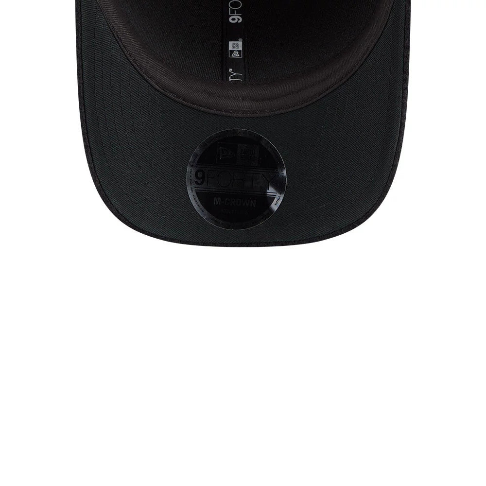 New Era Brushed Fleece Black 9FORTY M-Crown Adjustable Cap, inside view showing the black taping along the interior crown panels with 9FORTY printed in white, featuring a black 9FORTY size sticker on the underside of the black visor.