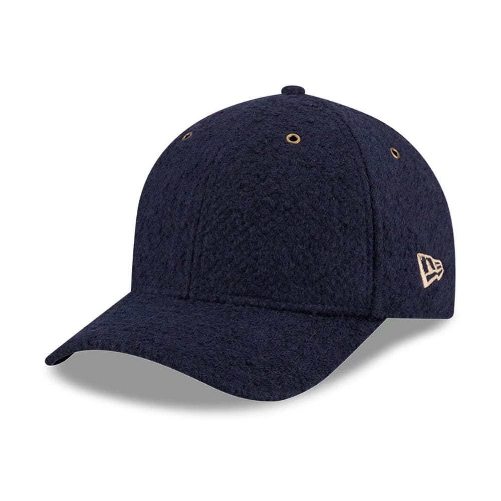 Pictured is this New Era Brushed Fleece 9FORTY M-Crown cap in navy. 1