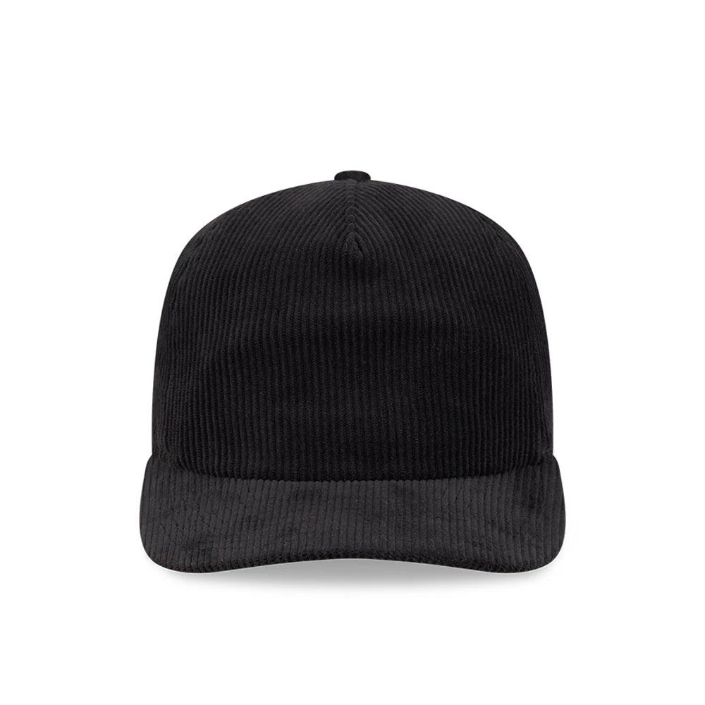New Era Wide Cord Black 19TWENTY Adjustable Cap, front view showing the all-black wide corduroy texture covering the entire structured crown and the slightly curved visor, with a top button accentuating the seamless design.