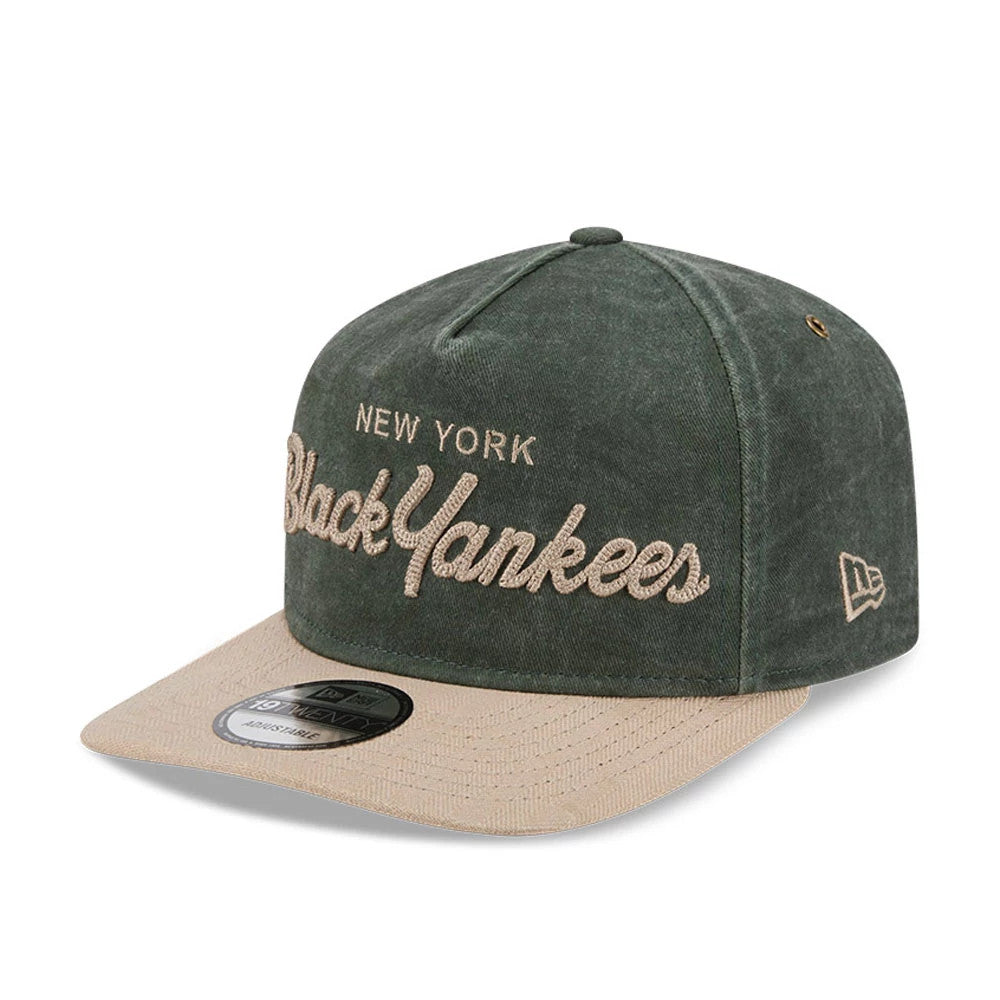 New York Black Yankees MLB Negro League Dark Green New Era 19TWENTY Adjustable Cap, three-quarter view showing raised beige embroidered lettering on the front panel, a flat tan visor with woven texture, and a 19TWENTY size sticker.