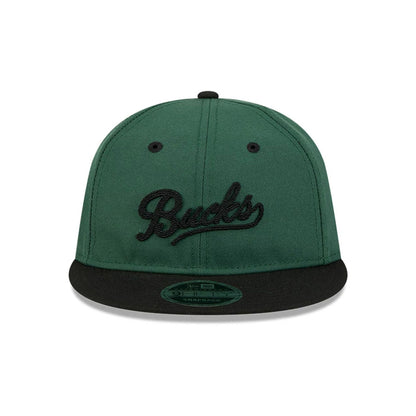 Pictured is this NBA Chainstitch Script Milwaukee Bucks Retro Crown 9FIFTY cap in dark green. 2