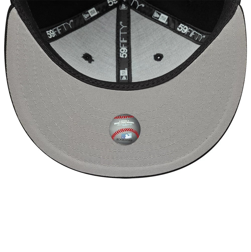 New York Yankees MLB Faux Pearl Black New Era 59FIFTY Fitted Cap, inside view showing black branded taping, a grey undervisor, and a holographic sticker featuring a baseball illustration at the centre.