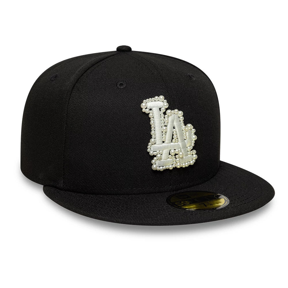 LA Dodgers MLB Faux Pearl Black New Era 59FIFTY Fitted Cap, three-quarter view showing an LA logo embellished with faux pearls on the front panel, a black flat visor with a gold 59FIFTY size sticker, and a structured black crown.