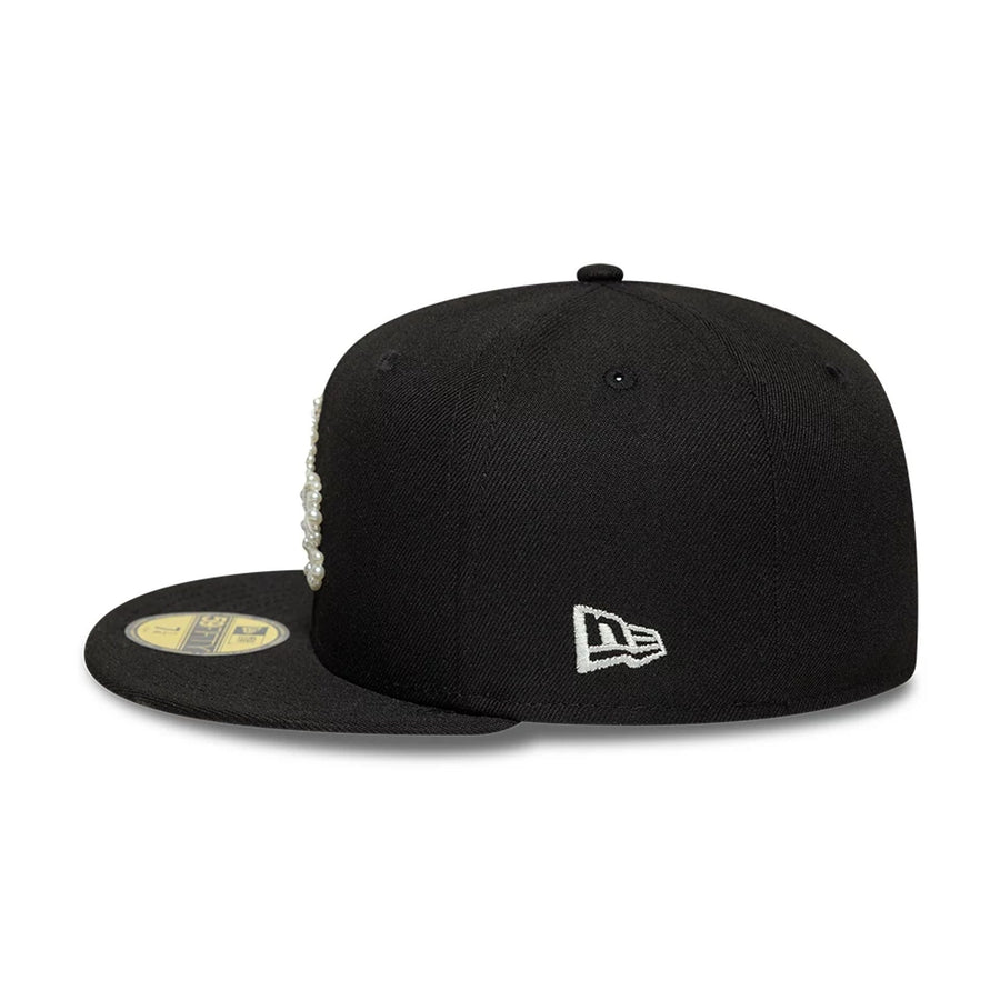 Pictured is this MLB Faux Pearl LA Dodgers 59FIFTY Fitted cap in black. 6