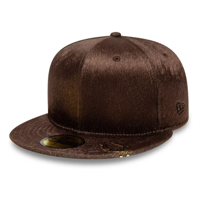 Pictured is this New Era Faux Pony 59FIFTY Fitted cap in dark brown. 1
