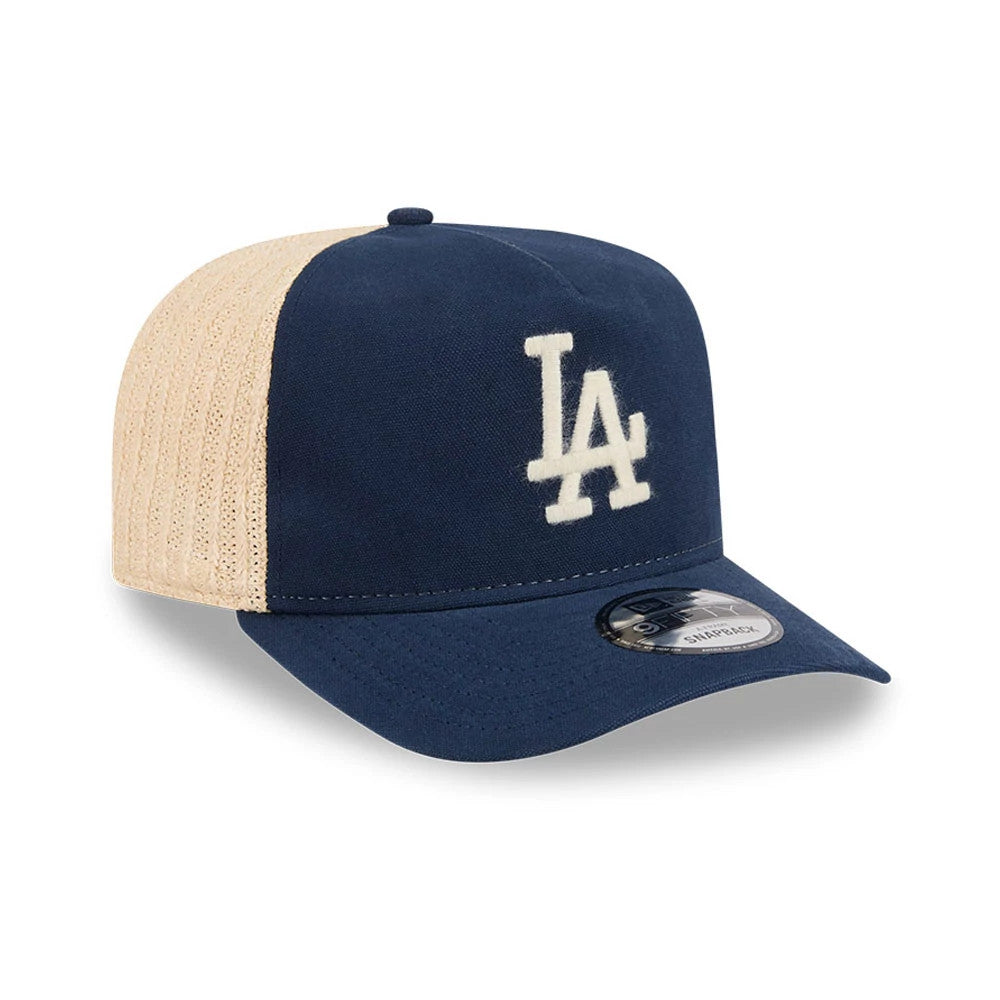 Pictured is this MLB Grained LA Dodgers 9FIFTY A-Frame Snapback cap in dark blue. 4