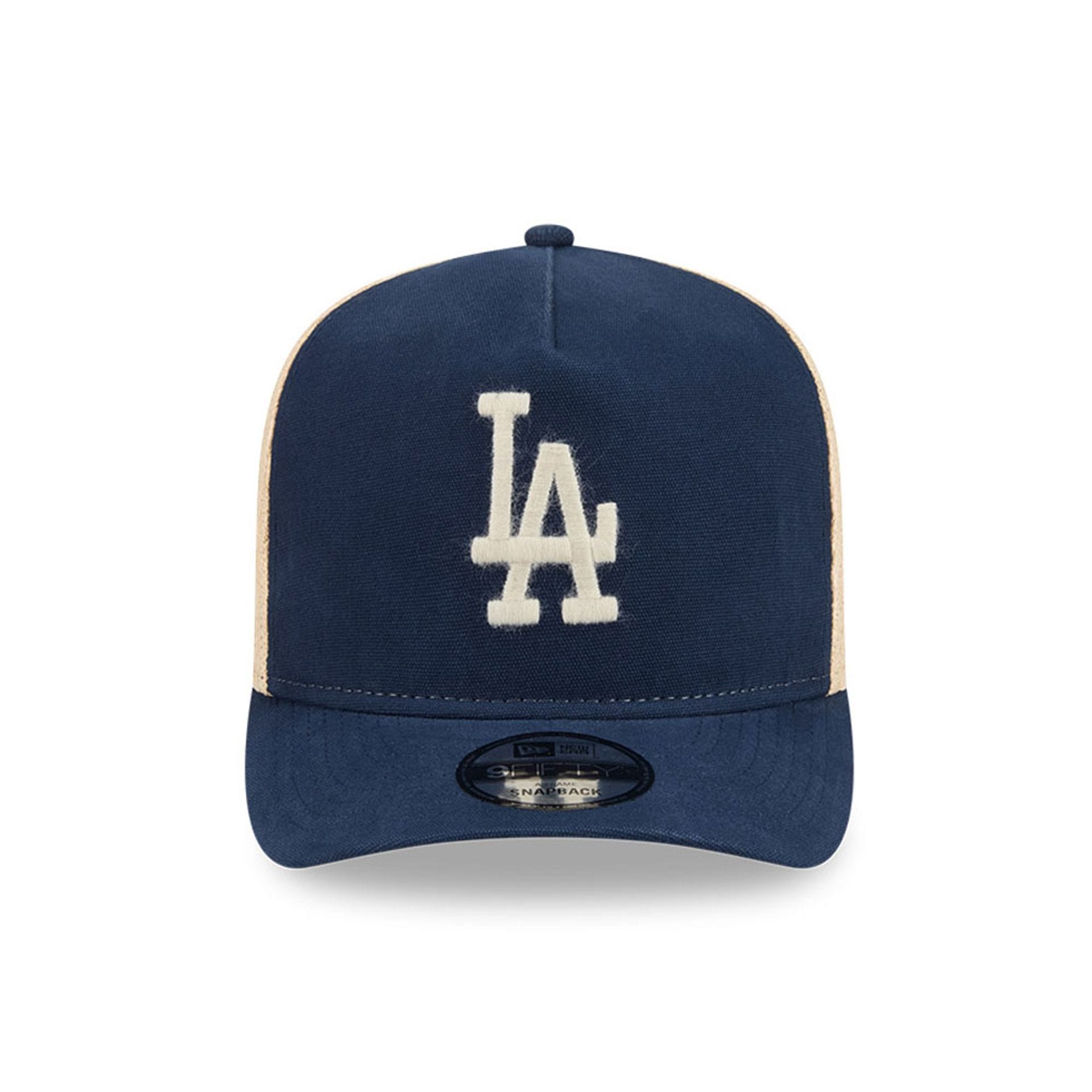 Pictured is this MLB Grained LA Dodgers 9FIFTY A-Frame Snapback cap in dark blue. 3