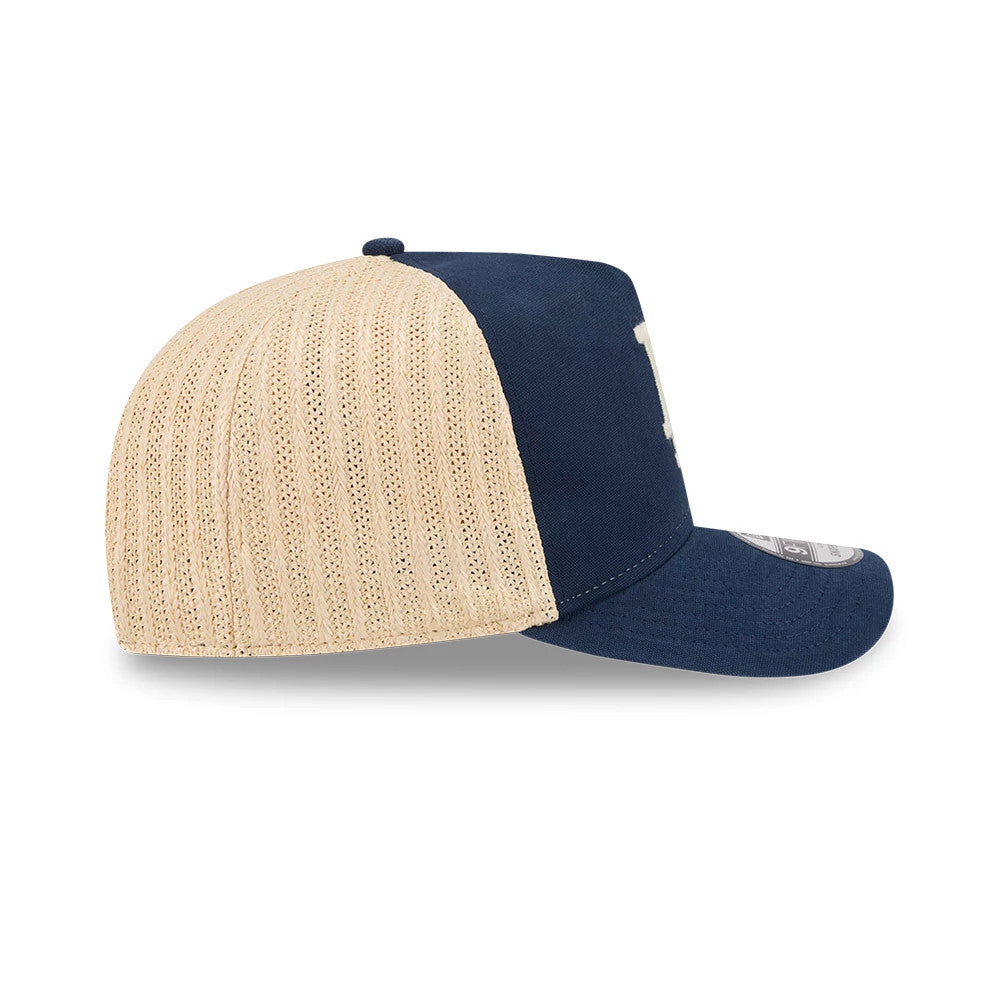Pictured is this MLB Grained LA Dodgers 9FIFTY A-Frame Snapback cap in dark blue. 7