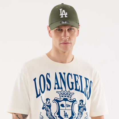 The model is wearing this MLB Life Graphic LA Dodgers T-Shirt in light beige. 6