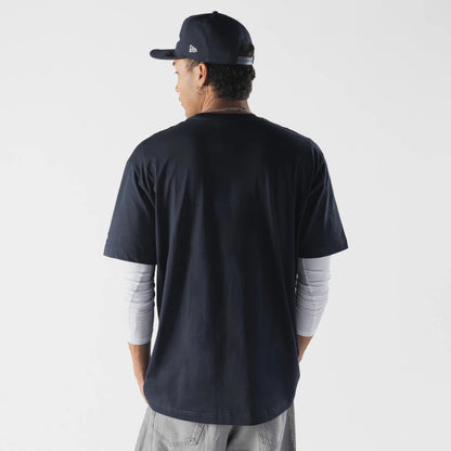 The model is wearing this MLB Life Graphic New York Yankees T-Shirt in navy. 2