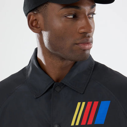 The model is wearing this Nascar Logo Jacket in black. 7