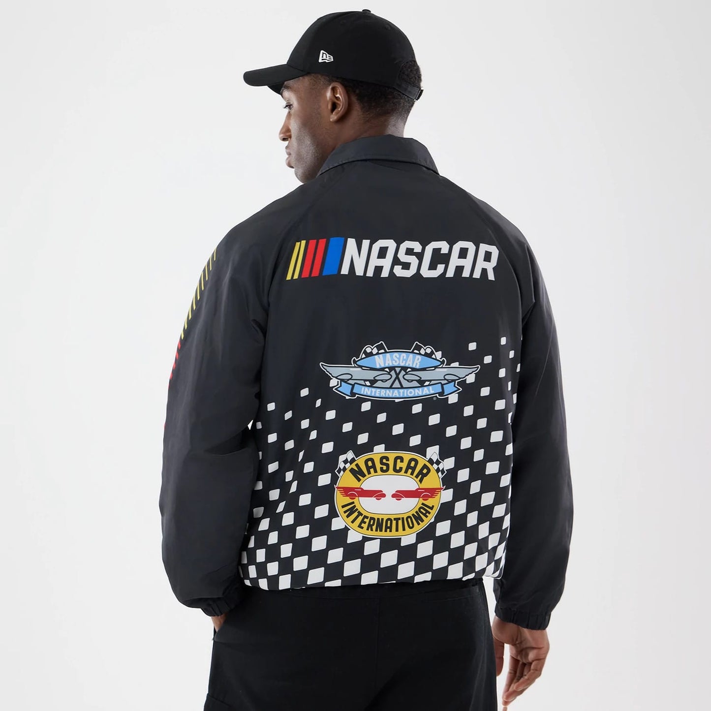 The model is wearing this Nascar Logo Jacket in black. 2