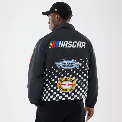 The model is wearing this Nascar Logo Jacket in black. 2
