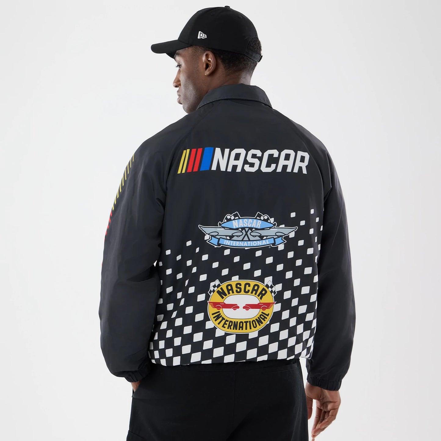 The model is wearing this Nascar Logo Jacket in black. 2