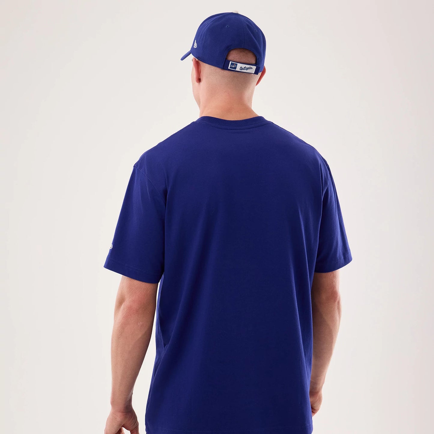 The model is wearing this MLB Life Graphic LA Dodgers T-Shirt in dark blue. 2