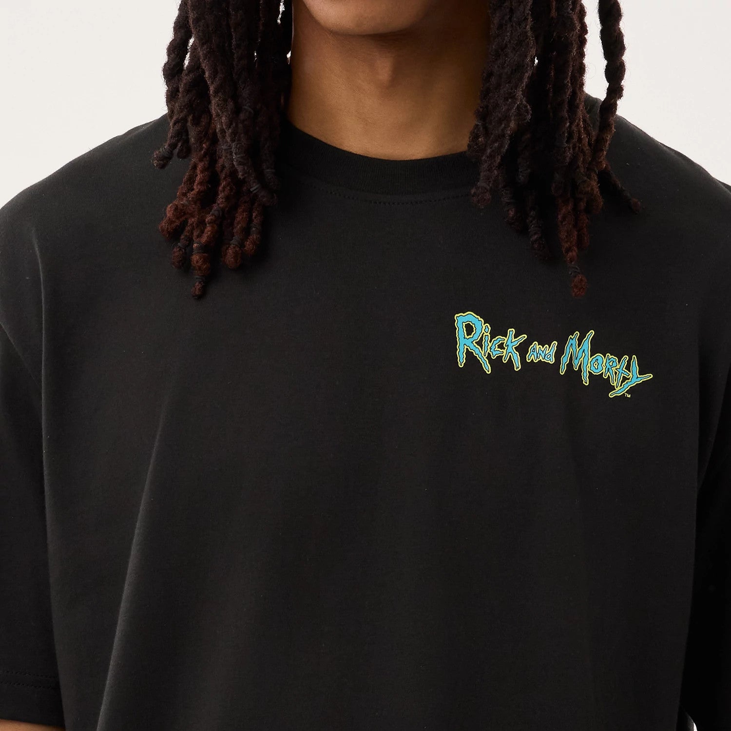 The model is wearing this Rick And Morty Portal Gun T-Shirt in black. 3