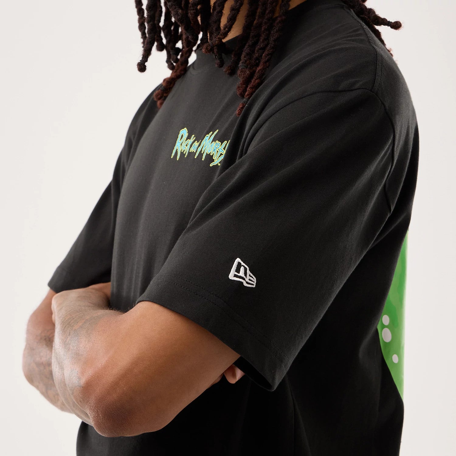 The model is wearing this Rick And Morty Portal Gun T-Shirt in black. 6