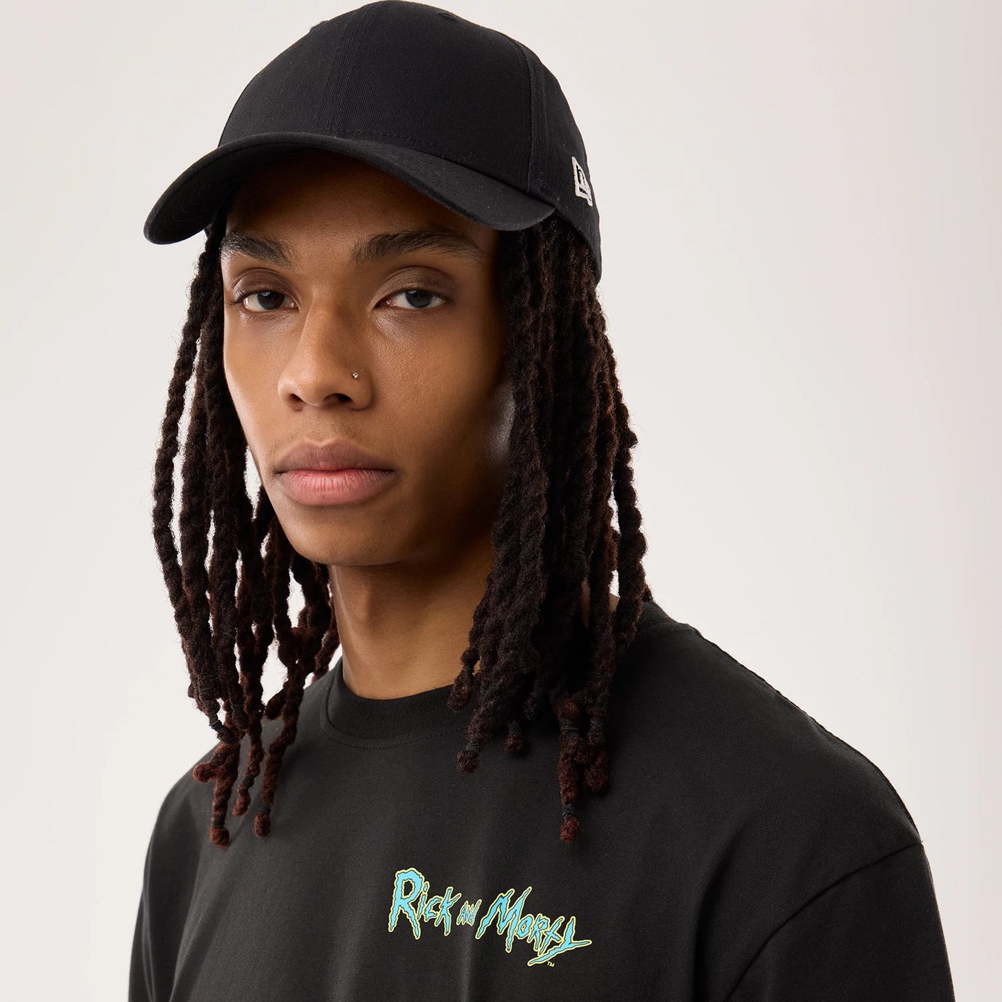 The model is wearing this Rick And Morty Portal Gun T-Shirt in black. 7