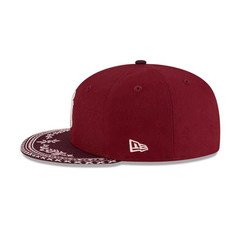 Pictured is this MLB Flourishes New York Yankees 59FIFTY Fitted cap in dark red. 6