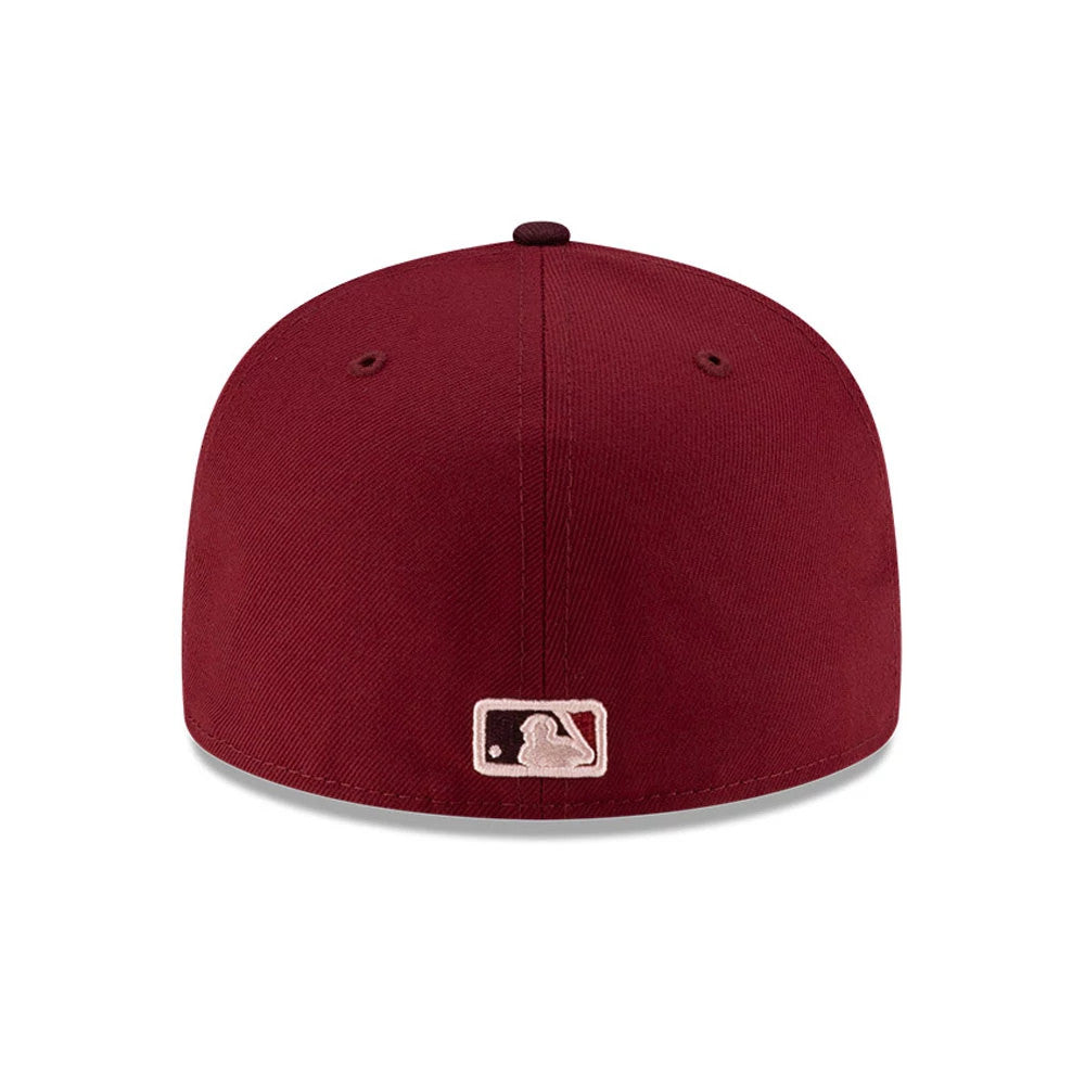 Pictured is this MLB Flourishes New York Yankees 59FIFTY Fitted cap in dark red. 7