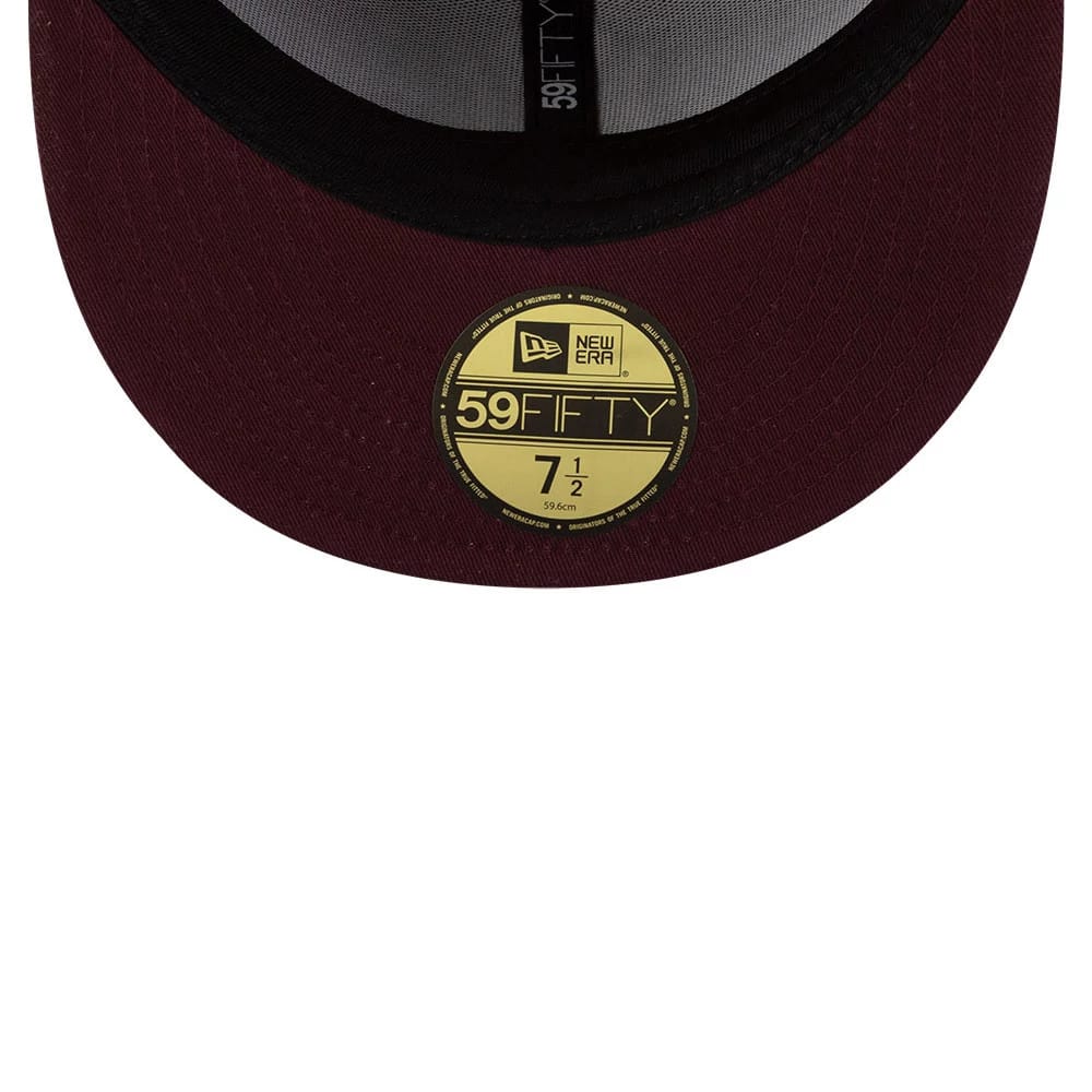 Pictured is this MLB Flourishes New York Yankees 59FIFTY Fitted cap in dark red. 2