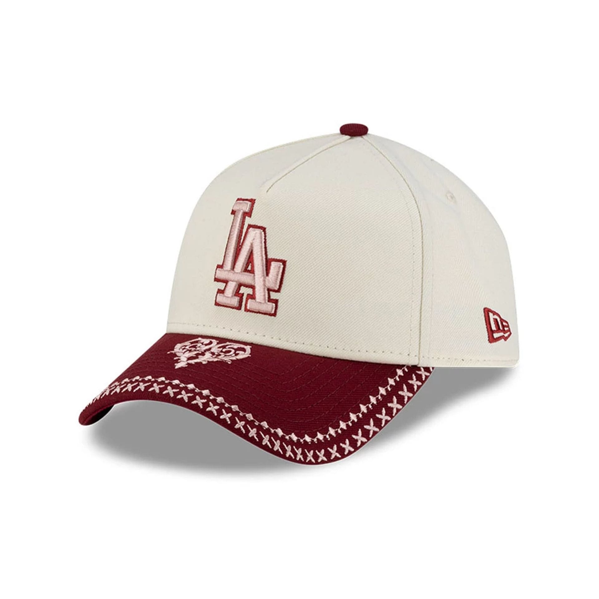 Pictured is this MLB Flourishes LA Dodgers 9FORTY A-Frame cap in white. 3