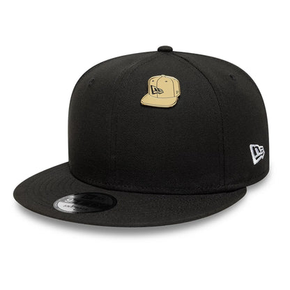 Pictured is this New Era 59FIFTY Fitted Pin Badge in gold. 2